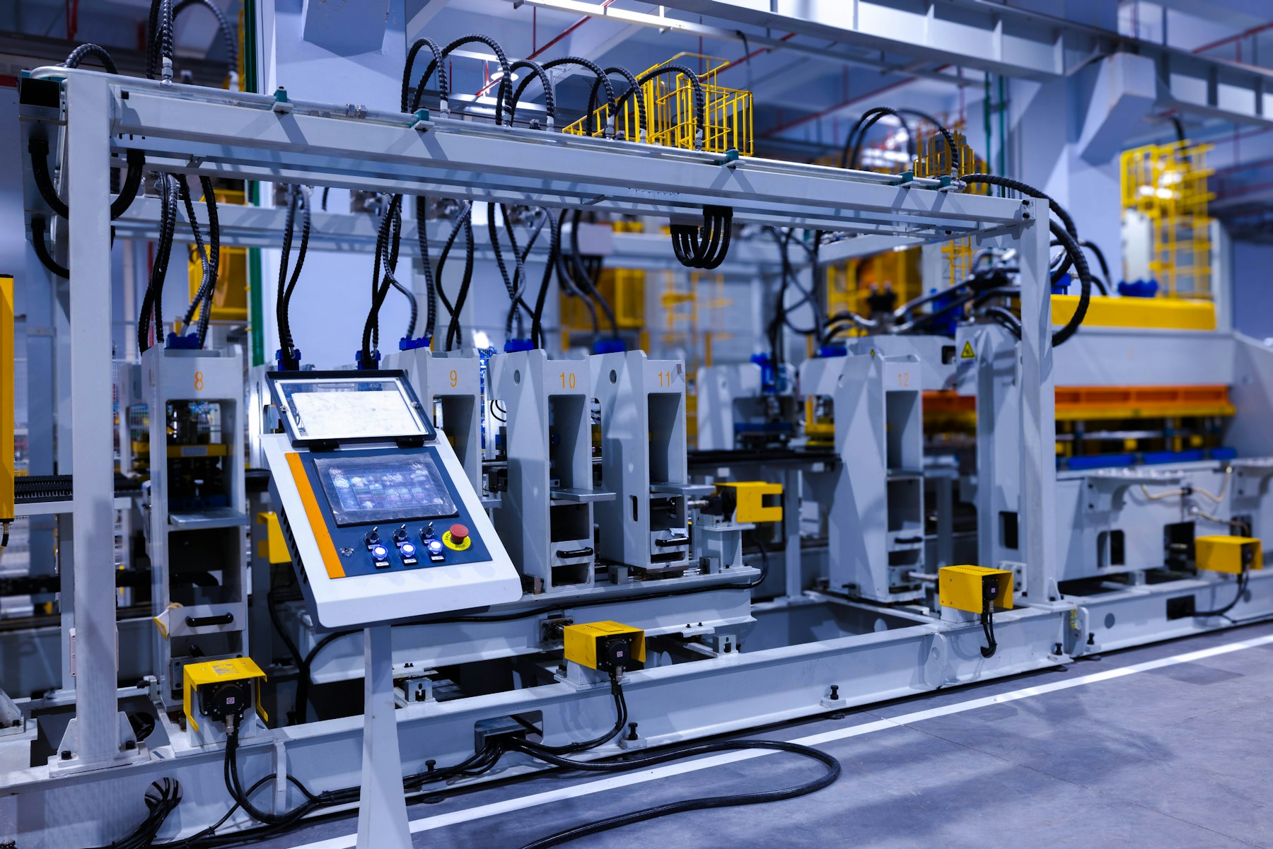 Manufacturing equipment and a control panel on a factory production line